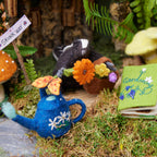 Skunk with Flowers Ornament