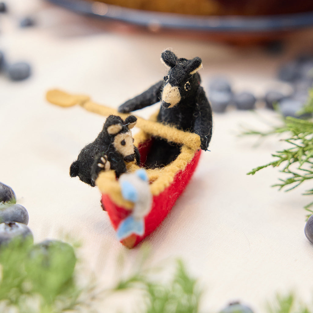 Black Bears in Canoe