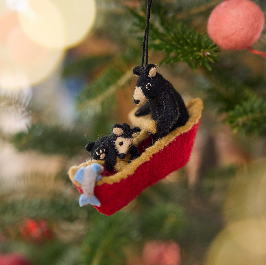 Black Bears in Canoe