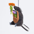 Skunk with Flowers Ornament