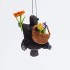 Skunk with Flowers Ornament